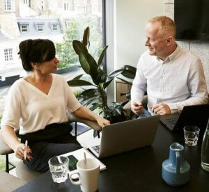 cropped-man-and-woman-discussing-and-sharing-ideas