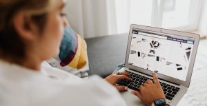 woman on laptop browsing internet